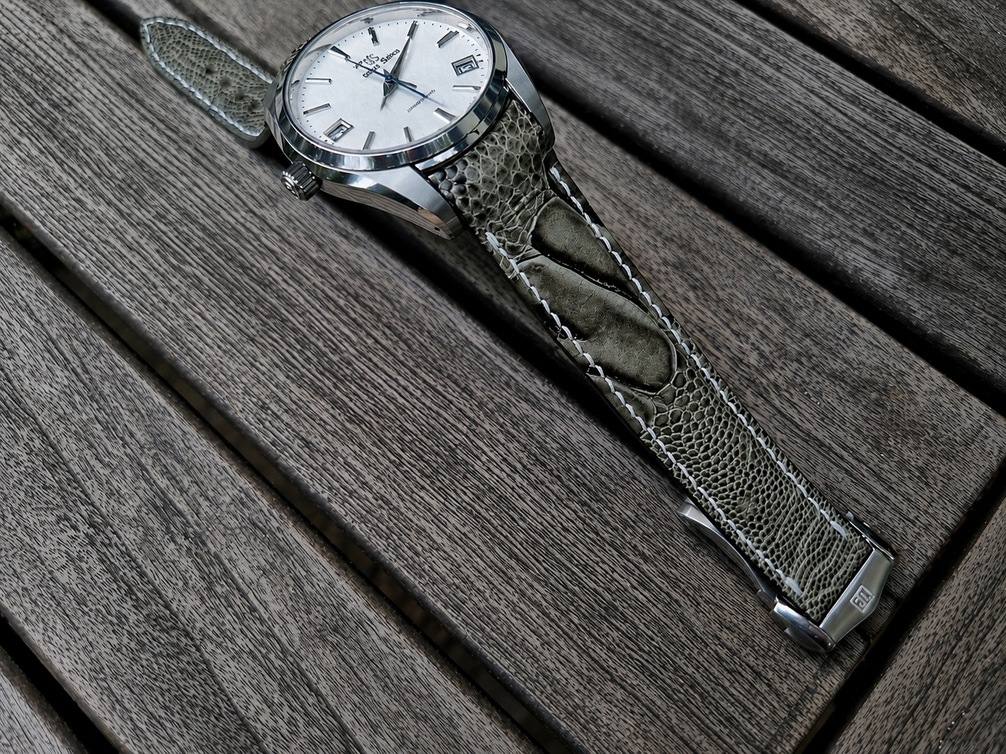 Olive Grigio Verde Ostrich Leg skin watch strap on Grand Seiko Snowflake. Handcrafted by Dangerous9straps
