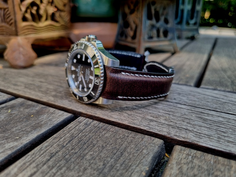 Mahogany Kangaroo strap for Rolex (5) Mahogany kangaroo leather watch strap with curved lug fitment, handcrafted in premium leather for a seamless case integration and vintage-inspired luxury watch style.
